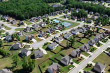 Aerial View Of Clean Suburban Cul-de-sac Streets And Homes In The Eastern United States.  