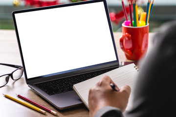 man of business laptop  man hand working on laptop computer on wooden desk Laptop with blank screen on table compute screen mockup