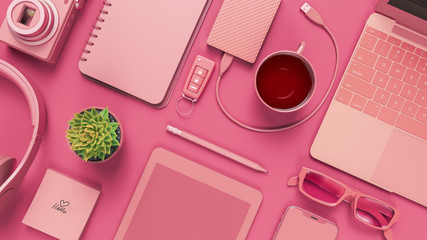 Pink office desk table with blank notebook.