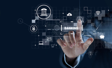 Fototapete - Businessman touching icon and word banking on global network connection, virtual screen dark background.