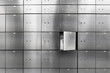 Metal safe box panel wall with open one. Concept for sucurity and banking protection.