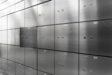Metal Safe Box Panel Wall With Open One. Concept For Sucurity And Banking Protection.