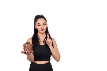 Wall Mural -  girl eating cake on white background