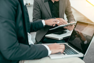 Asian businessmen using touchpad at meeting working workplace Office