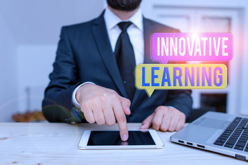 Poster - Word writing text Innovative Learning. Business photo showcasing Interdisciplinary teaching that stirs analytic thinking Male human wear formal clothes present presentation use hi tech smartphone