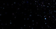 © Yuriy - Flying dust particles on a black background