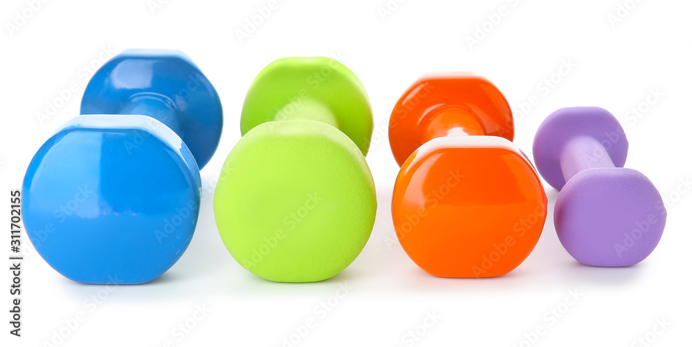 Different dumbbells on white background