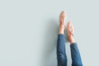 © Pixel-Shot - Legs of young woman in stylish shoes against light background