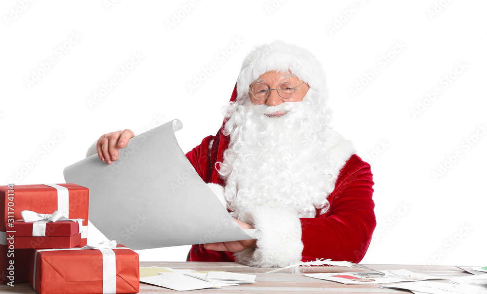 Santa Claus reading wish list on white background