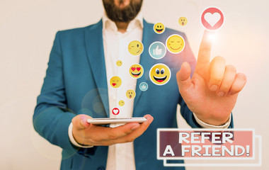Poster - Writing note showing Refer A Friend. Business concept for direct someone to another or send him something like gift