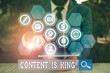 © Zofia - Writing note showing Content Is King. Business concept for marketing focused growing visibility non paid search results