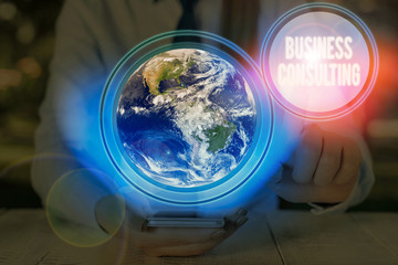 Poster - Writing note showing Business Consulting. Business concept for practice of helping organizations improve perforanalysisce Elements of this image furnished by NASA