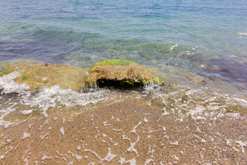 Unusual stone in sea water.