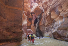 Jordan January 2019 Tourists In Wadi Mujib Is A Gorge In Jordan Which Enters The Dead Sea At 410 Meters Below Sea Level. The Mujib Reserve Of Wadi Mujib Is The Lowest Nature Reserve In The World