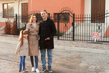 Wall Mural - Young family near their new house