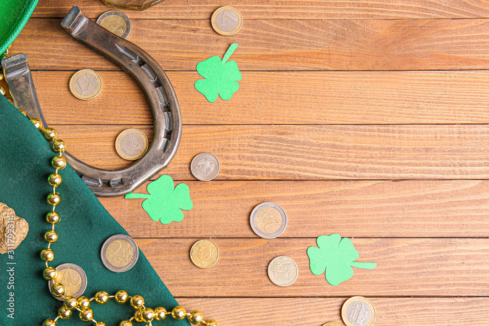 Composition for St. Patrick's Day on wooden background
