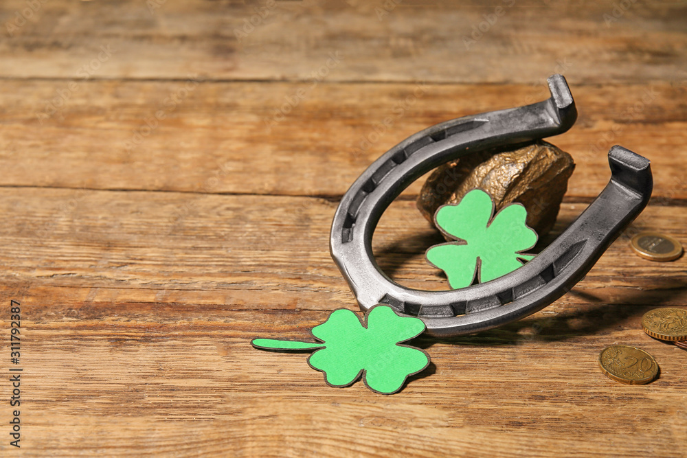 Composition for St. Patrick's Day on wooden background