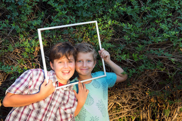 Two boys smiling cheerfully