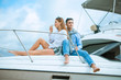 © Air_Lady - Romantic couple in love on sail boat at under sunlight on yacht. Happy exclusive alternative lifestyle concept. Love story of two lovers. Two young tourists having fun on boat tour in the summertime