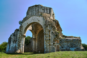 Wall Mural - Ruins of a medieval stone church next to the town of Magliano in Toscana, Italy..