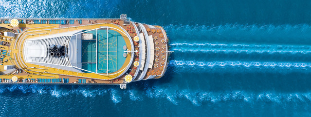 Wall Mural - Aerial view of beautiful white cruise ship above luxury cruise close up at stern of cruise sail with contrail in the ocean sea  concept smart tourism travel a vacation time on summer, webinar banner