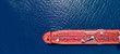 Aerial drone ultra wide photo of industrial petrochemical oil and gas fuel tanker ship cruising Mediterranean deep blue sea