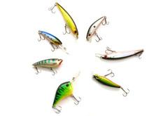 Voblers Isolated On A White Background. Composition Of Voblers. Set Of Voblers. Set Of Fish Lures With Hooks. The Composition Of The Fisherman. Set Of Lures For Spinning. Plastic Fish With Hooks. 