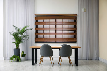 Modern empty wooden table in room interior