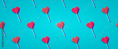 Photographie Flat lay heart shape lollipop on stick pattern Valentine day background