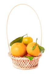 Wall Mural - tangerines  with leaves in a beautiful basket. organic ripe mandarins