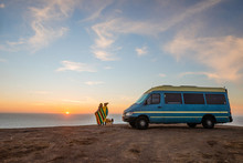 Camper Van Near Ocean Sunset