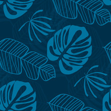 Tropical Pattern With White Leaves Of Monstera, Banana And Palm Trees On A Blue Background. Exotic Seamless Pattern.