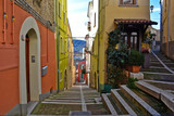 Fototapeta Uliczki - Campobasso, Italy, 24/12/2019. A narrow street between the old buildings of a medieval town