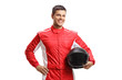 © Ljupco Smokovski - Male racer standing and holding a helmet