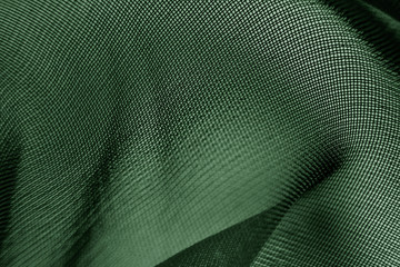 The texture of the mesh fabric close-up, macro photo. Spectacular background abstract image.