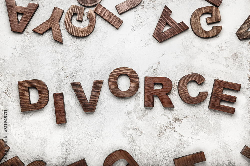 Many letters and word DIVORCE on light background