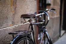 Old Vintage Bicycle Leaning On A Wall