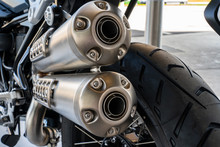 Rear View Of A Motorcycle With Double Exhaust