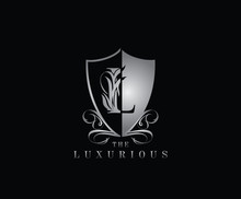 Luxury Guard L Letter Logo Icon. Silver L With Classy Shield Shape Design Perfect For Fashion, Jewelry, Beauty Salon, Cosmetics, Spa, Hotel And Restaurant Logo. 