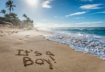 It's a Boy, gender reveal written in the sand on Sunset Beach in Hawaii