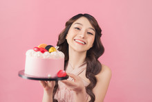 Generous Woman Holding Birthday Cake Front Pink Background