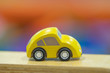 yellow car model on road, cars for kids Play set Educational toys for preschool indoor playground (selective focused)