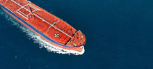 Aerial Drone Ultra Wide Photo Of Industrial Fuel And Gas Tanker Ship Cruising The Mediterranean Deep Blue Sea