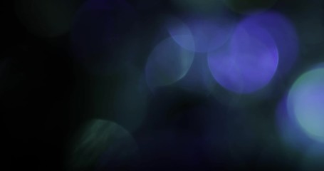 Wall Mural - Abstract bokeh light  background for overlay.  Real Lens flare light effect. Sparkle ray leak on black background. 