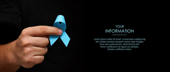 Wall Mural - Hand hold a blue ribbon. November month health check. Prevention of prostatitis. Cancer Awareness. No Shave Month. Web article template. Long header banner format. Sale coupon. Your information.