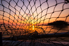 Dip Net In Boat Fishing On Sunrise, Sunset Water.