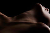 Sensual picture of woman's neck. Nude photography with visible collarbones. 