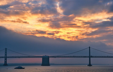 Fototapete - Bay Bridge at Sunrise with Ferry in Foreground