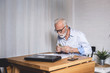 © focusandblur - Pensioner calculates the pension and bills