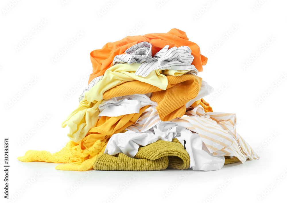 Heap of different clothes on white background